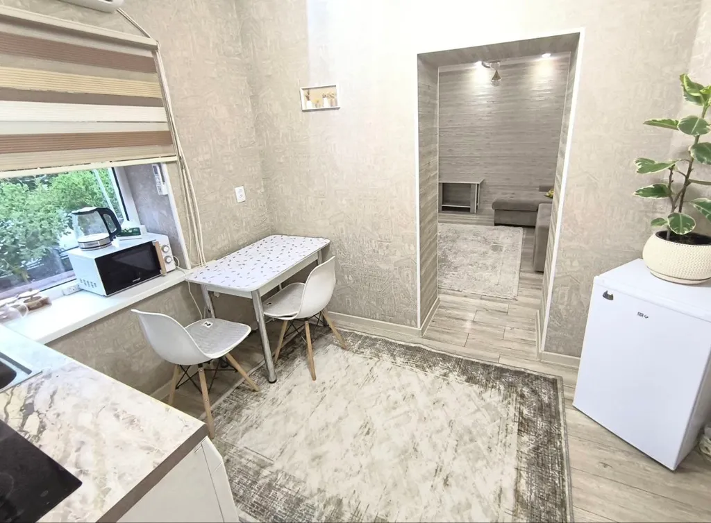 Уютный дом с садом рядом с центром города