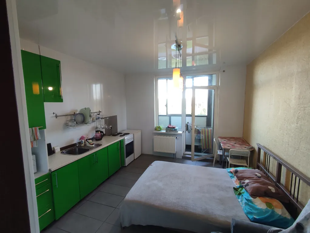 Студия в современном новом доме на проспекте Строителей