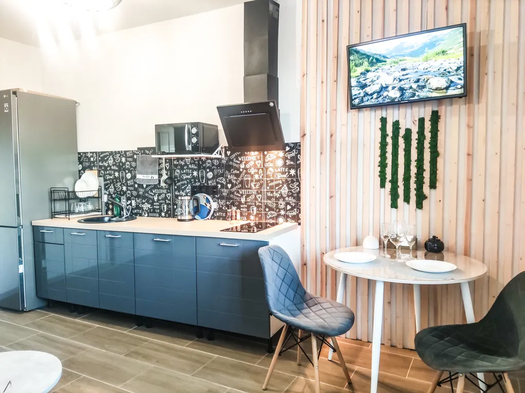 Квартира с просторной кухней-гостиной и видом на лес