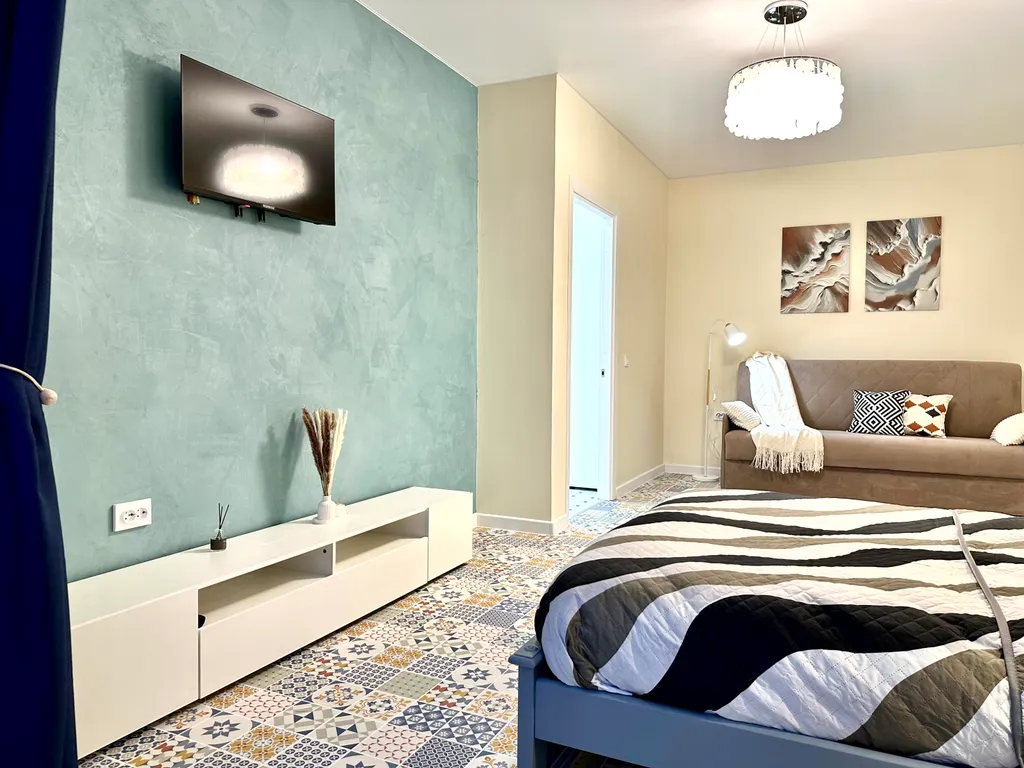 Светлые современные апартаменты в центре города