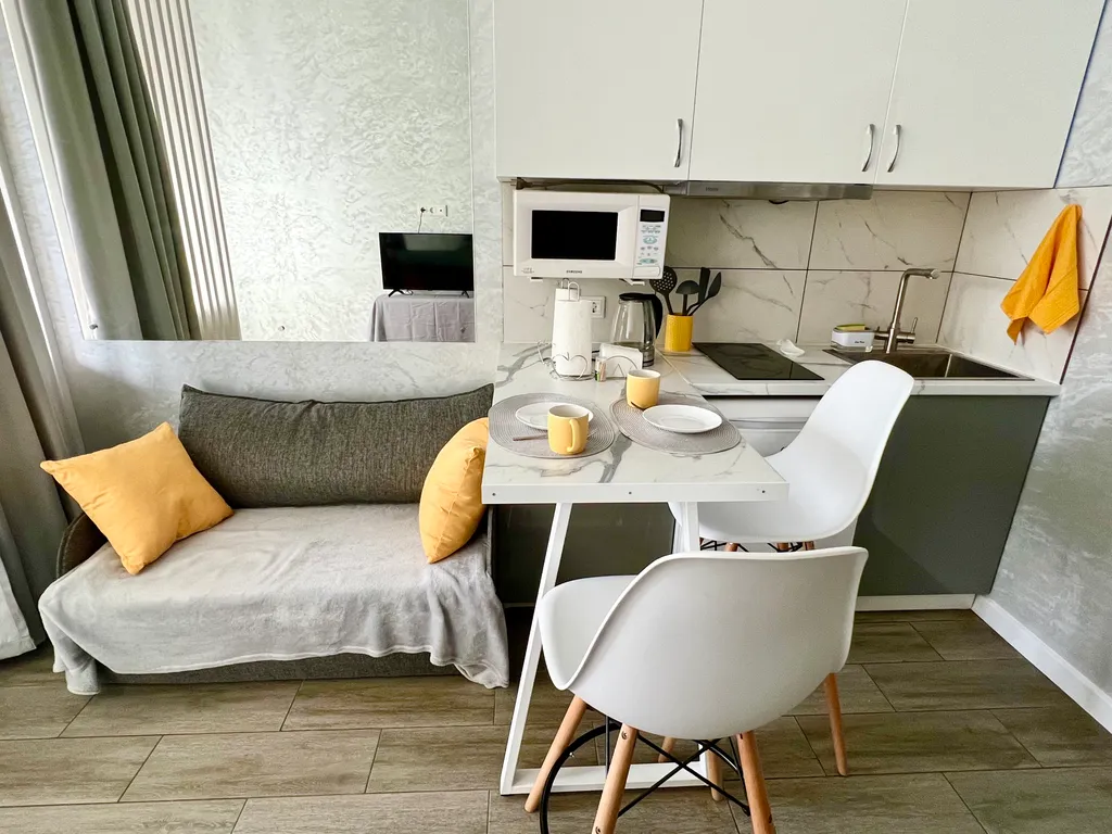 Светлая и уютная студия в центре города