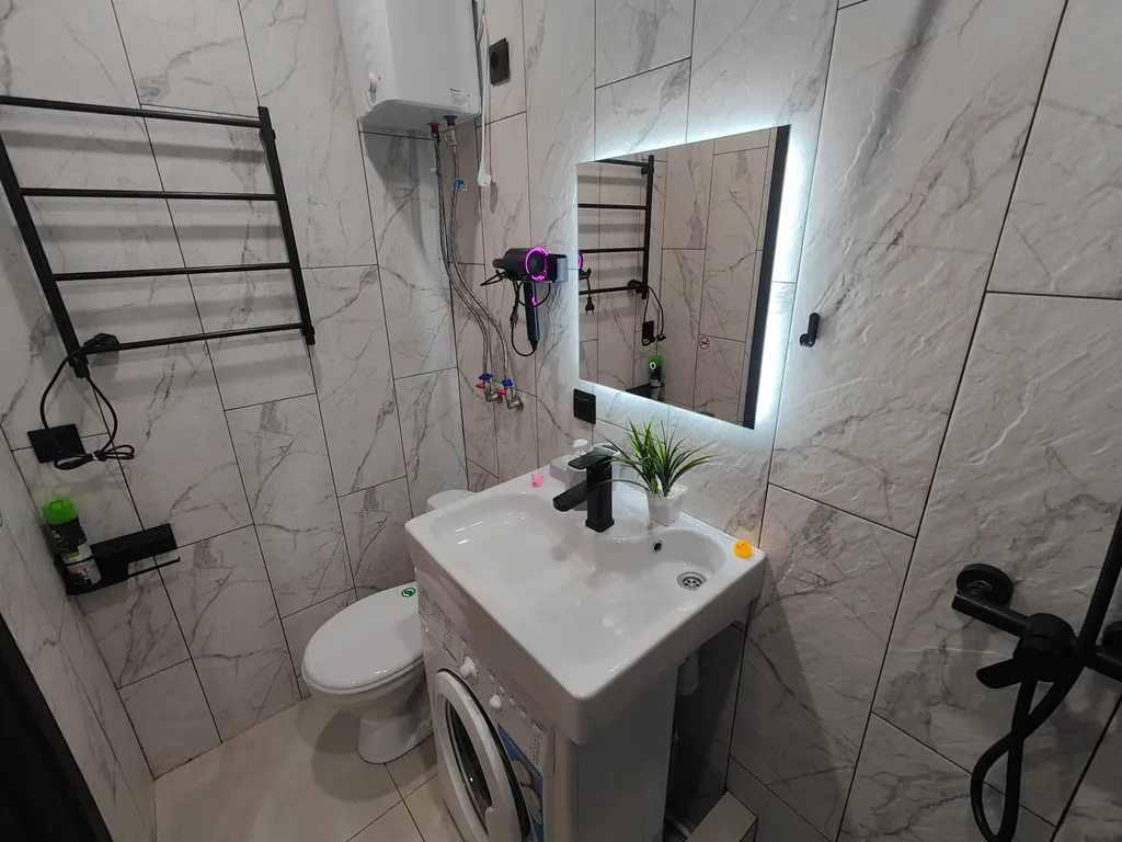 Квартира Уютная студия напротив университета и парка в центре Нефтяников — Омск