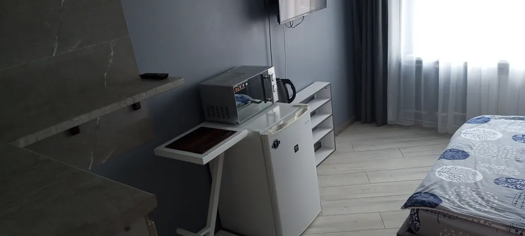 Уютная комната с прекрасным видом на город