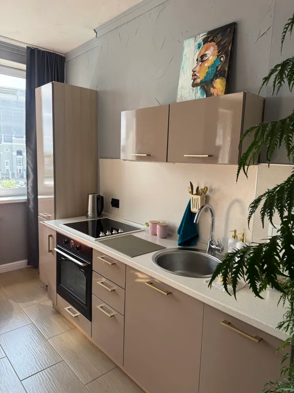 Уникальная студия с видом на стадион, арт-декором и PlayStation