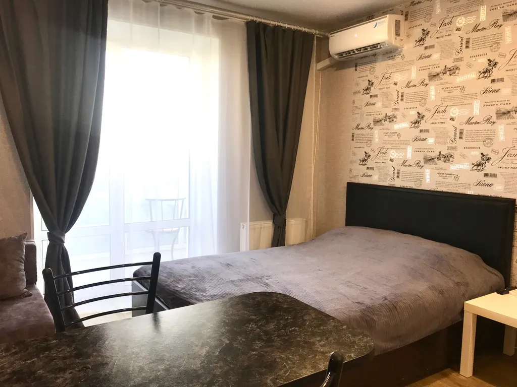 Квартира-студия с панорамным балконом