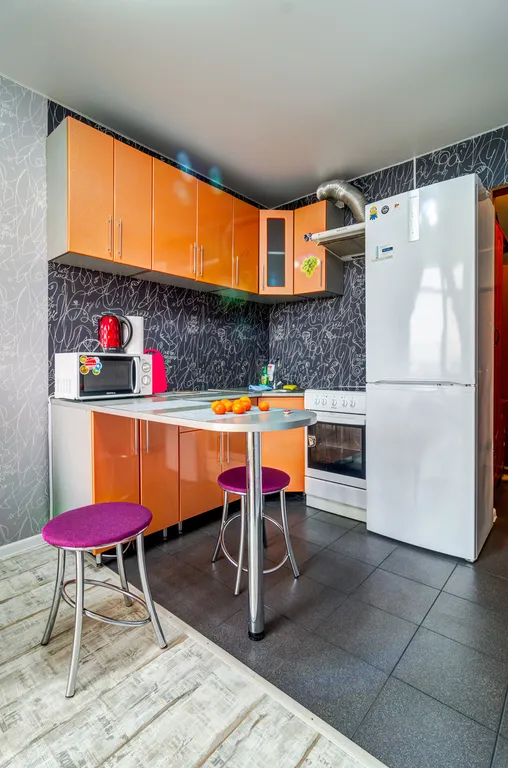 Апартаменты с панорамным окном и видом на город в Центре