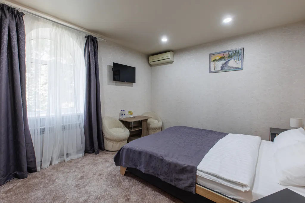 Уютный номер для двоих - двуспальная кровать