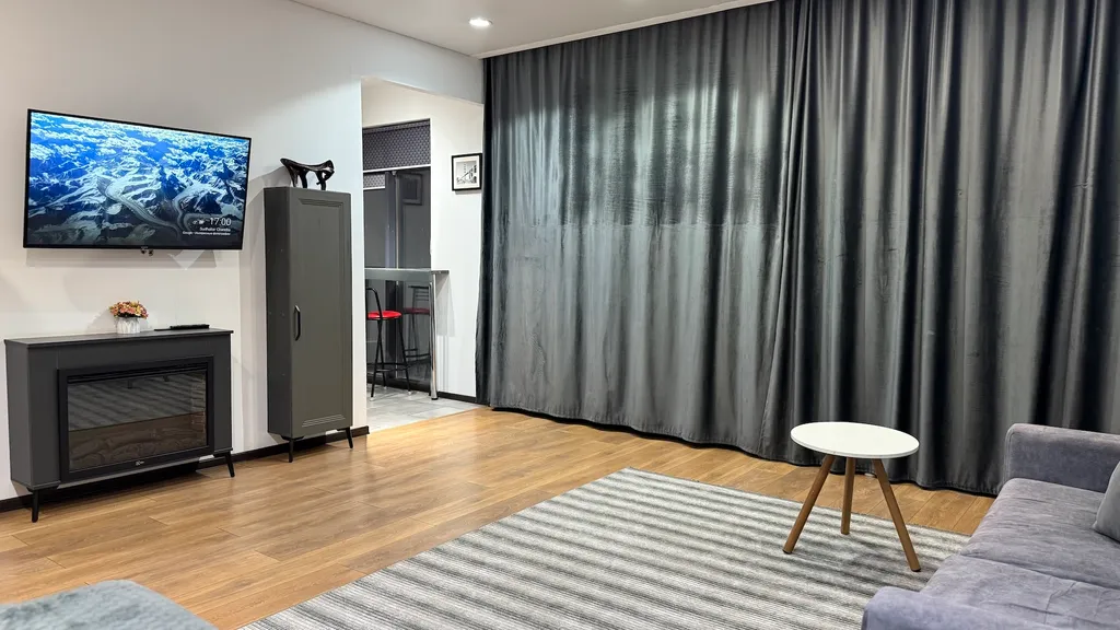 Апартаменты с террасой с видом на город и горы