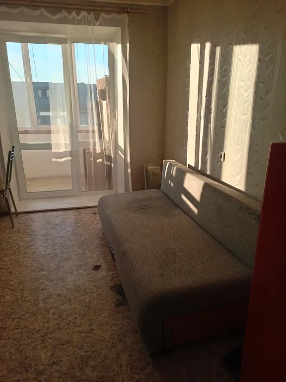 Уютная гостиная с лоджией