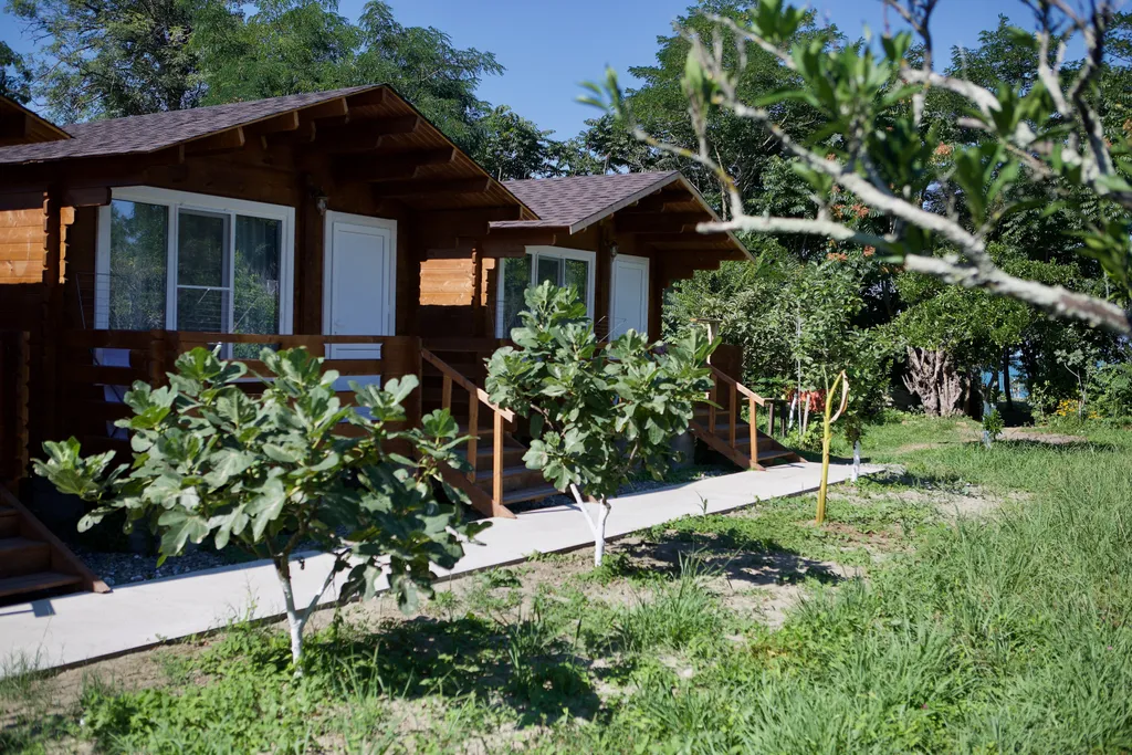 Коттедж Коттедж Уютные бунгало на берегу моря — Сухум