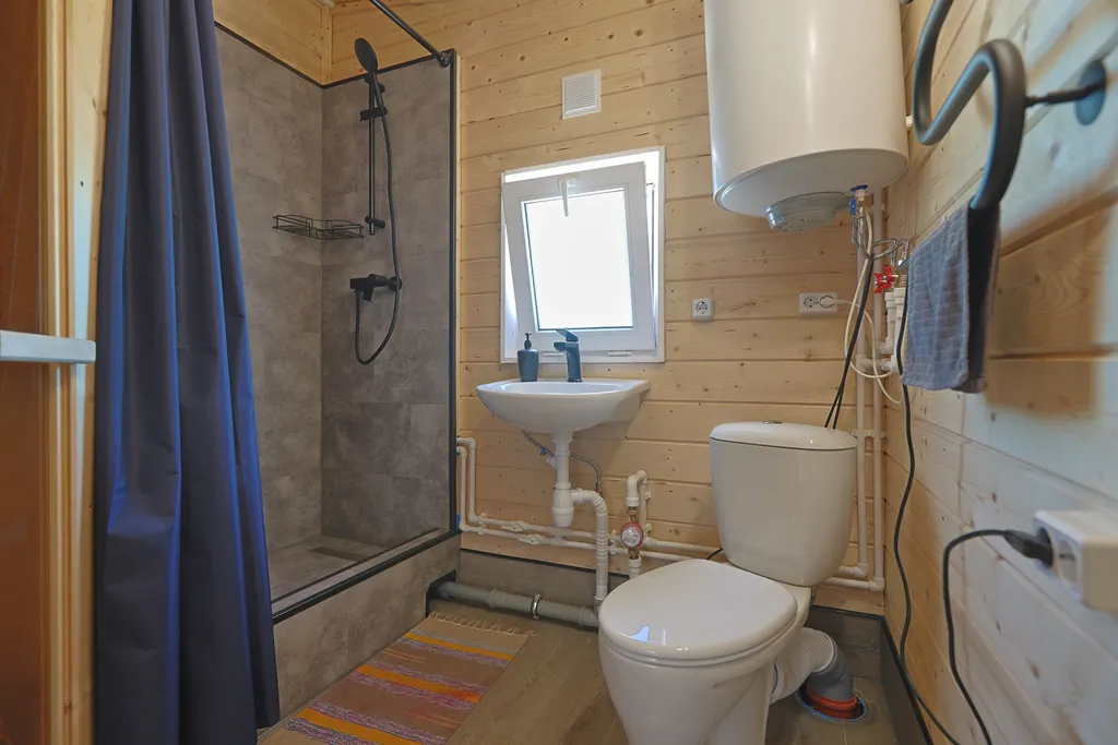 Уютный дом с сауной зоной барбекю и своей парковкой в черте города