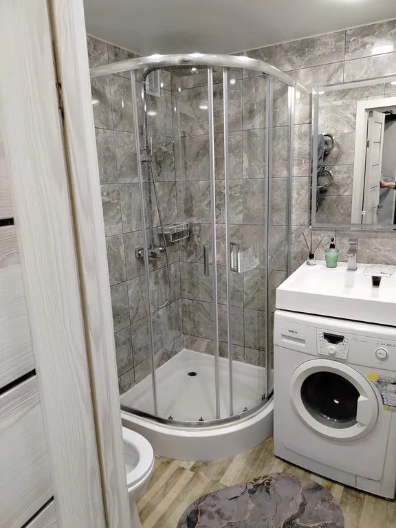 Уютная квартира в самом центре на набережной с видом на парк победы