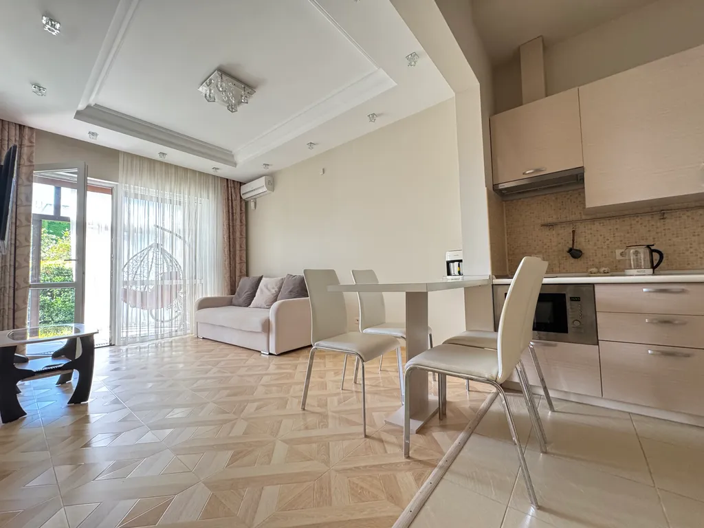 Уютная квартира в центре со своей террасой и бассейном