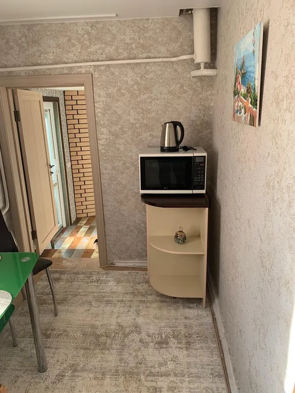 Полдома в центре города недалеко центр. рынок, удобный выезд в горы