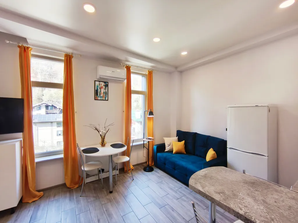 Современный апартамент-студия с видом на горы