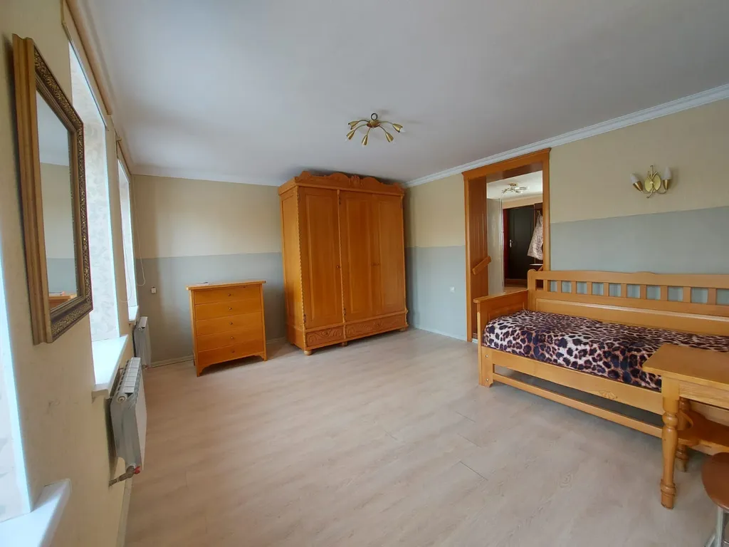 Дом в центре города на набережной реки Терек