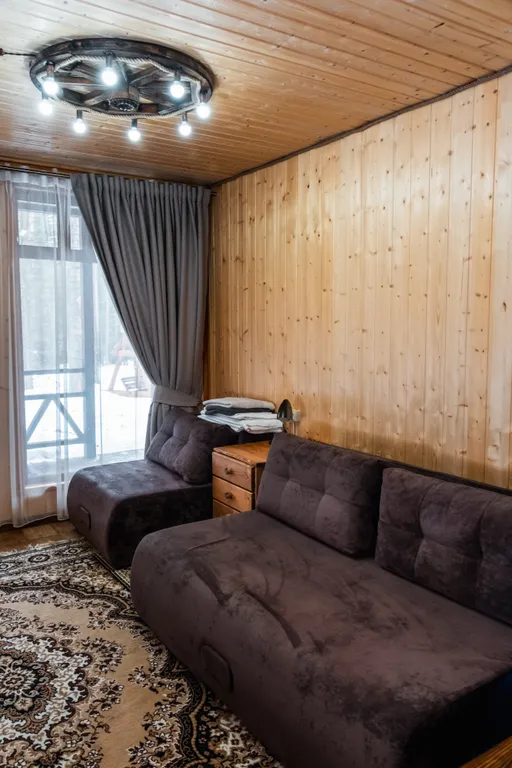 Домик у подножья горы Чегет