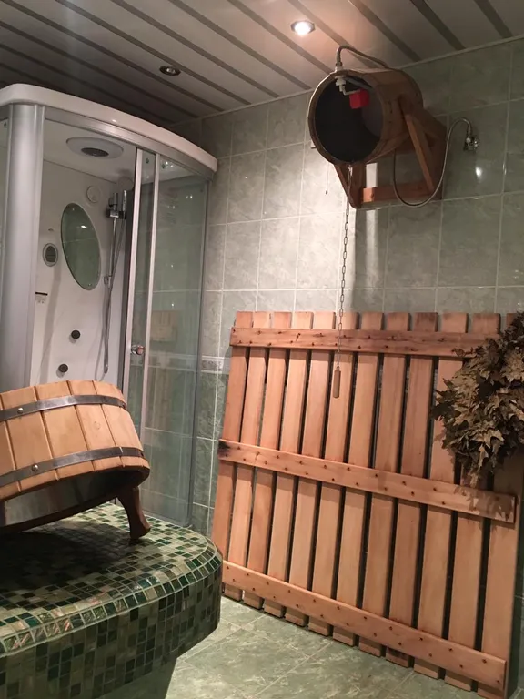 Бассейн в домике шале с сауной и мангалом