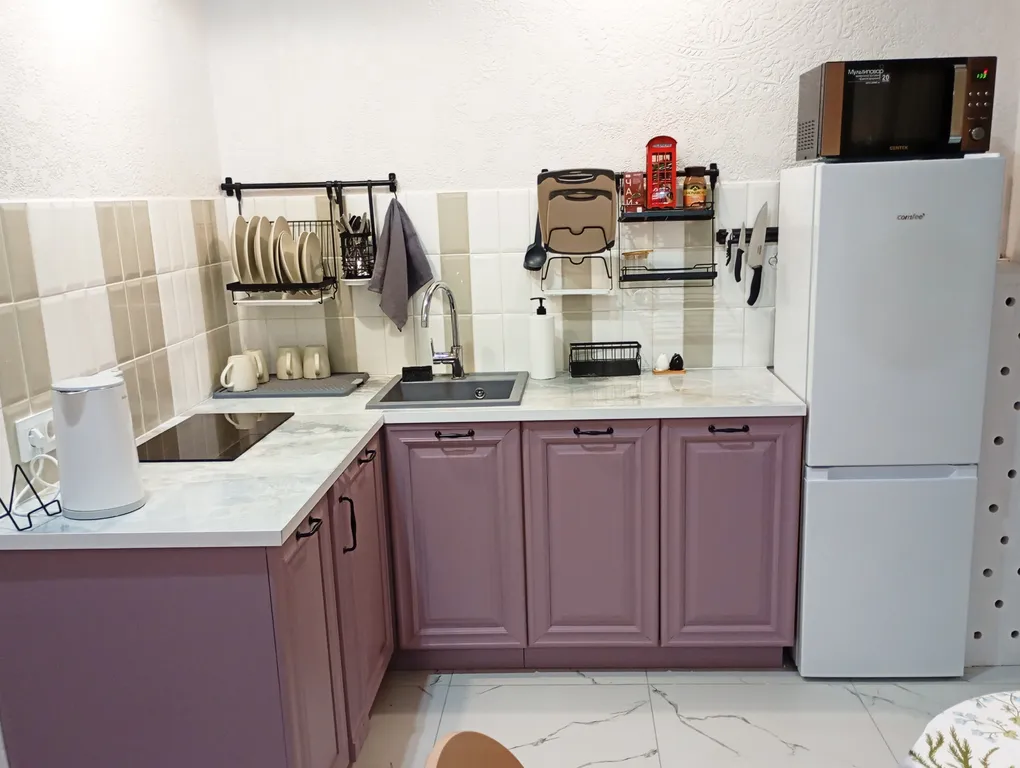 Уютная студия с высокими потолками