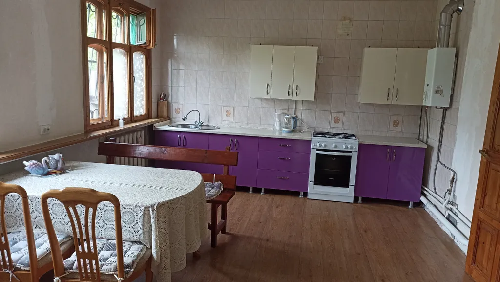 Дом с балконом