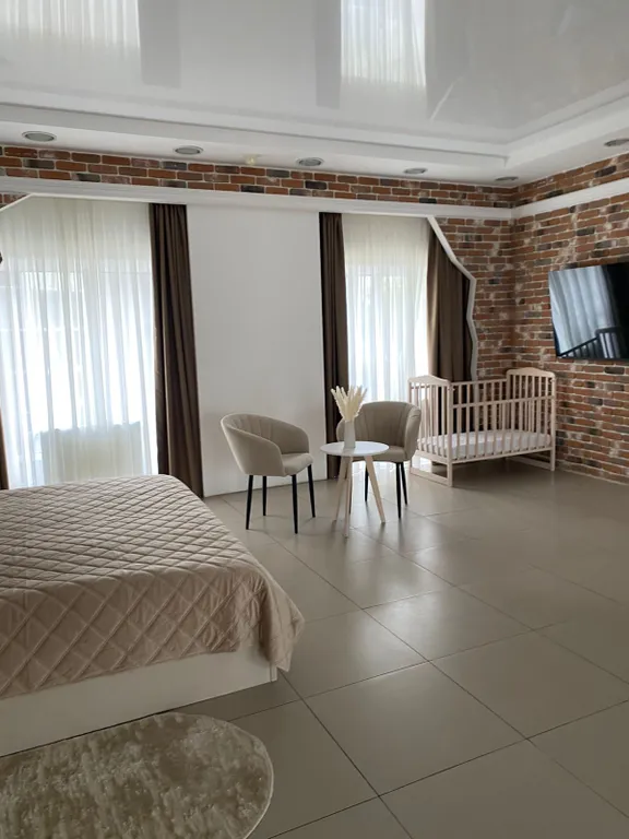 Уникальные апартаменты в центре города с панорамными окнами