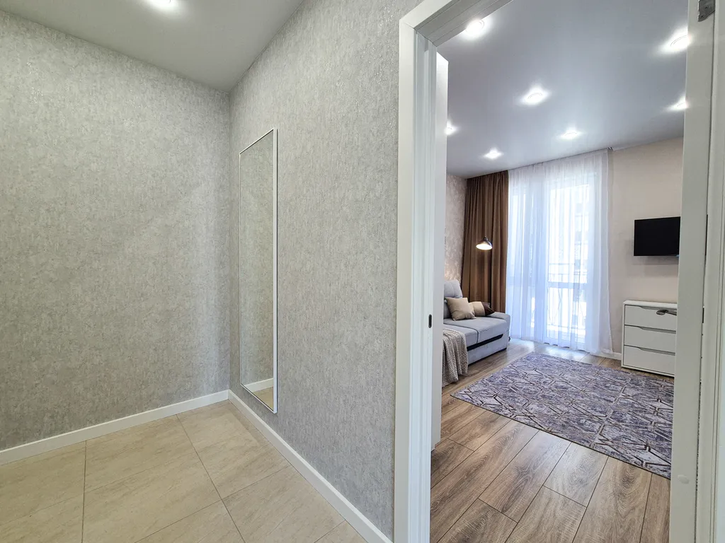 Потрясающая квартира с двумя балконами и видом на реку, лес и горы