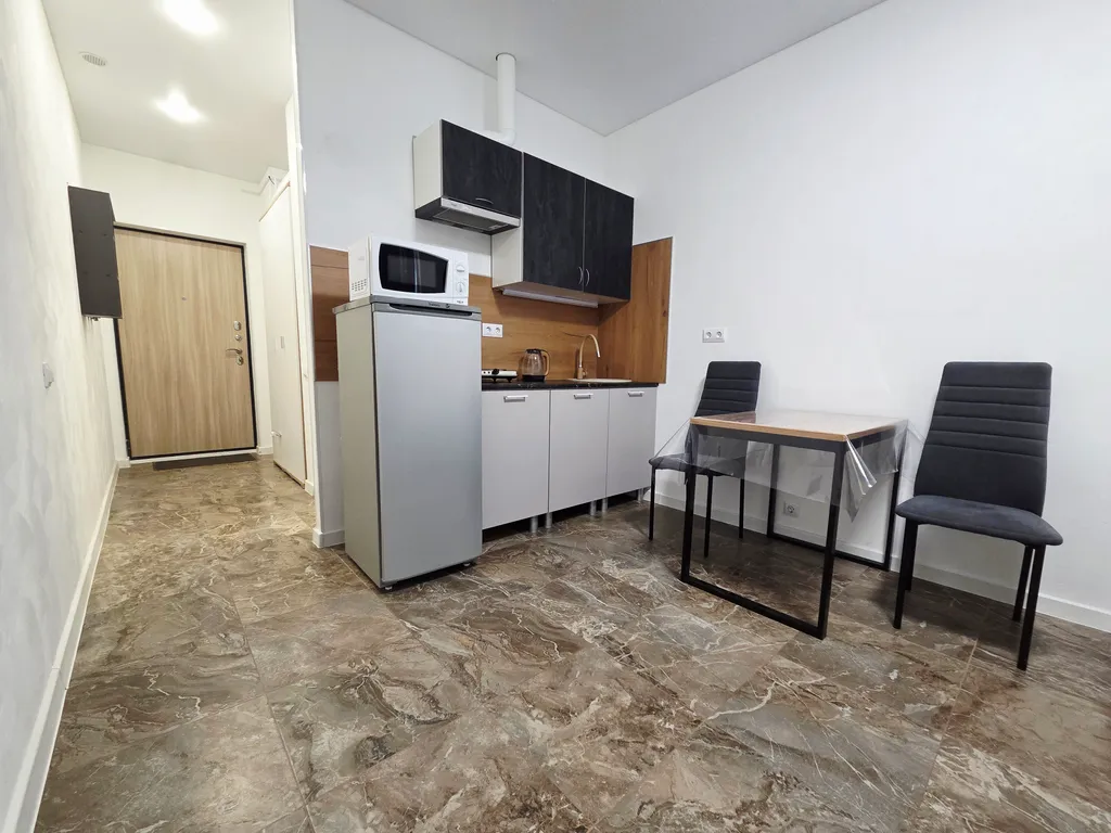 Уютная студия с видом на город