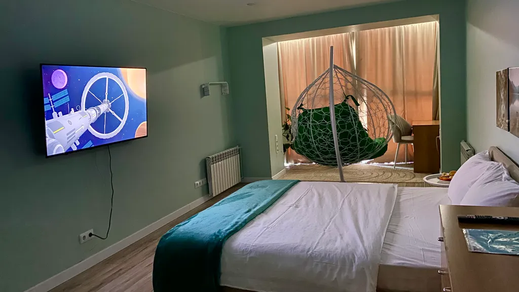 Ваш оазис спокойствия с видом на реку и горы в центре городской жизни