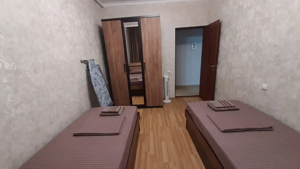 Уютный дом в центре города с местом для парковки автомобиля