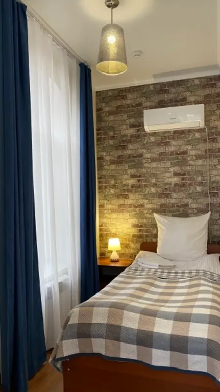 Улучшенный трехместный номер с 3 отдельными кроватями