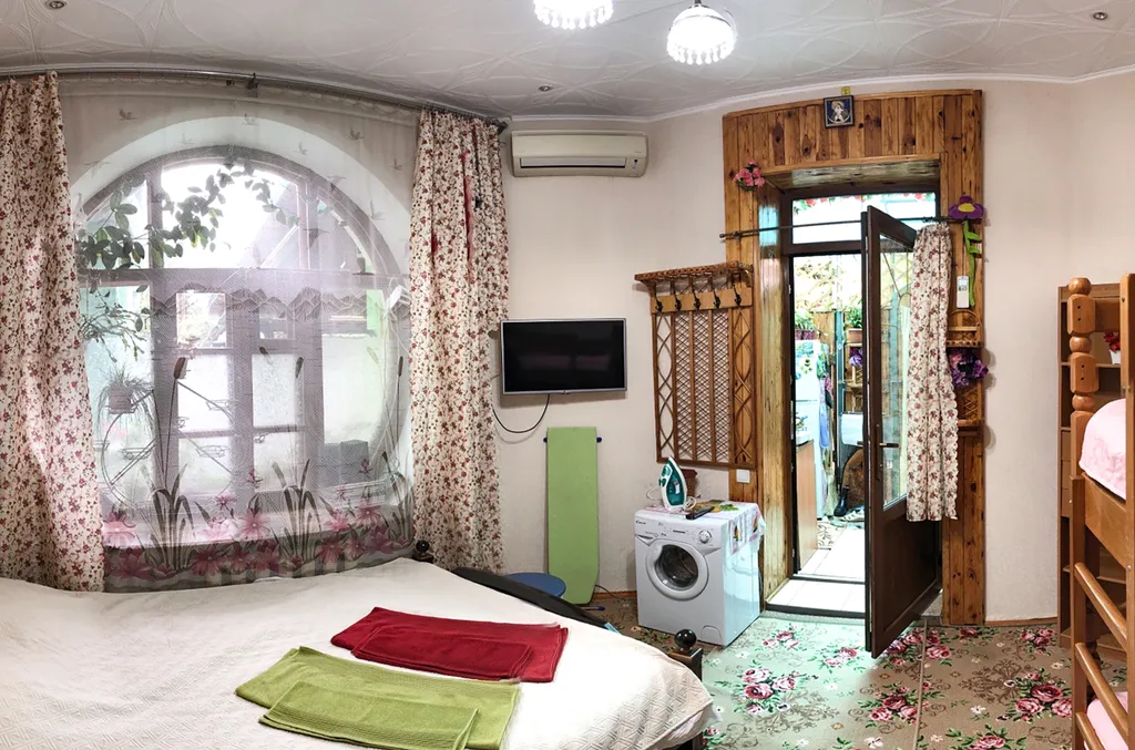 Уютная квартира с летней верандой-кухней