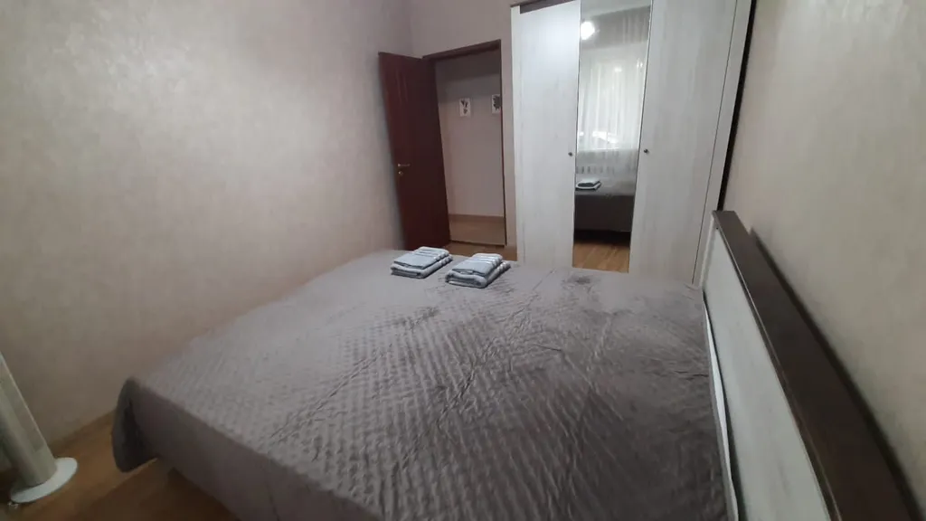 Уютный дом в центре города с местом для парковки автомобиля