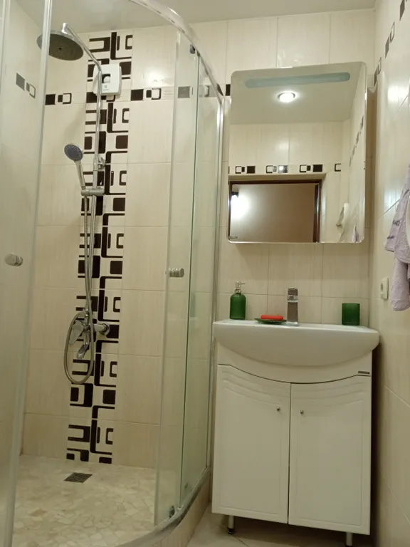 Квартира с видом на набережную и горы