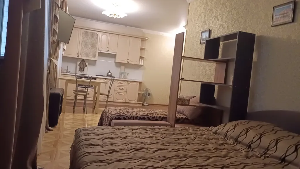 Уютная, светлая студия на первом этаже в тихом месте в центре города