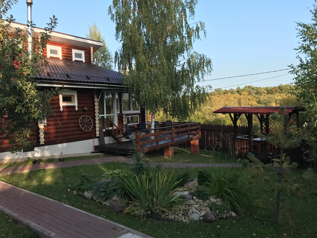 Дом из бревна Терем с сауной в черте города