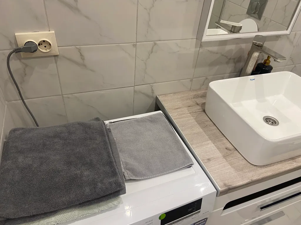 Уютная квартира в новом современном доме, в центральной части города