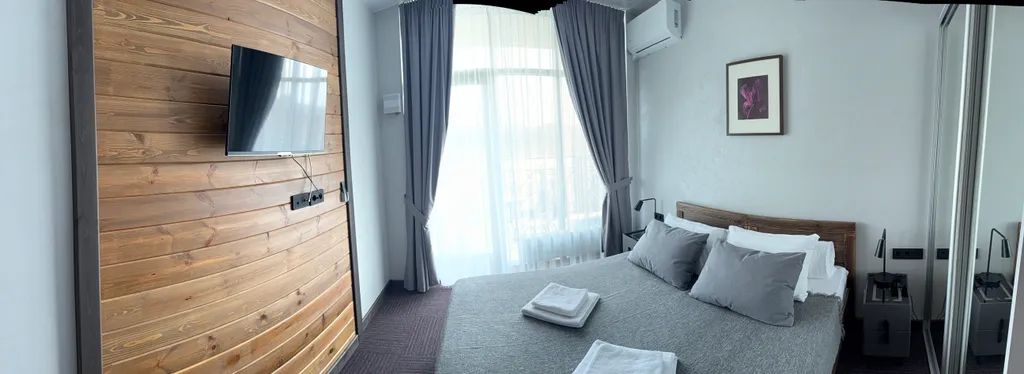 Семейный апартамент у озера на горнолыжном курорте Солнечная Долина