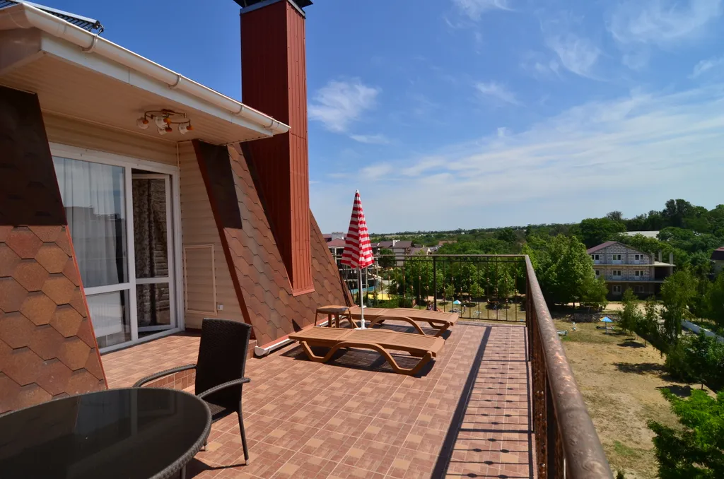 Четырехместный номер категории Люкс с террасой