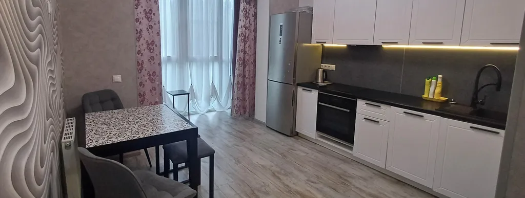 Уютная квартира в спальном районе города с видом на лес