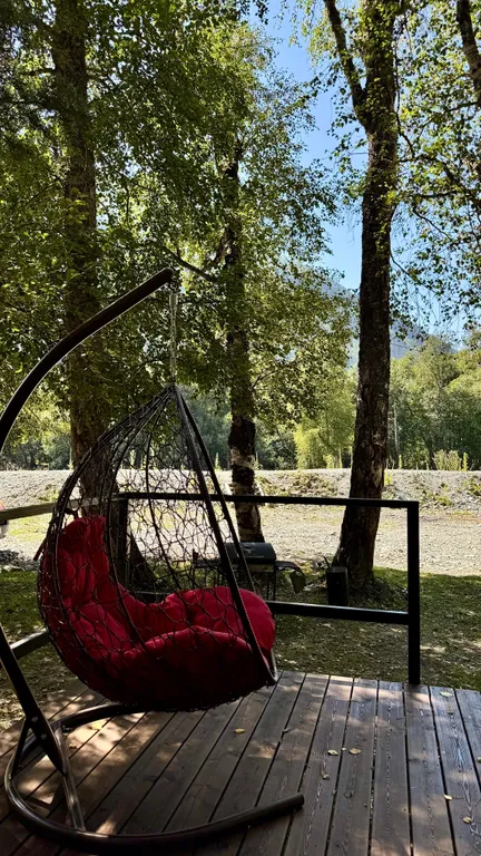 Шале с террасой на берегу реки