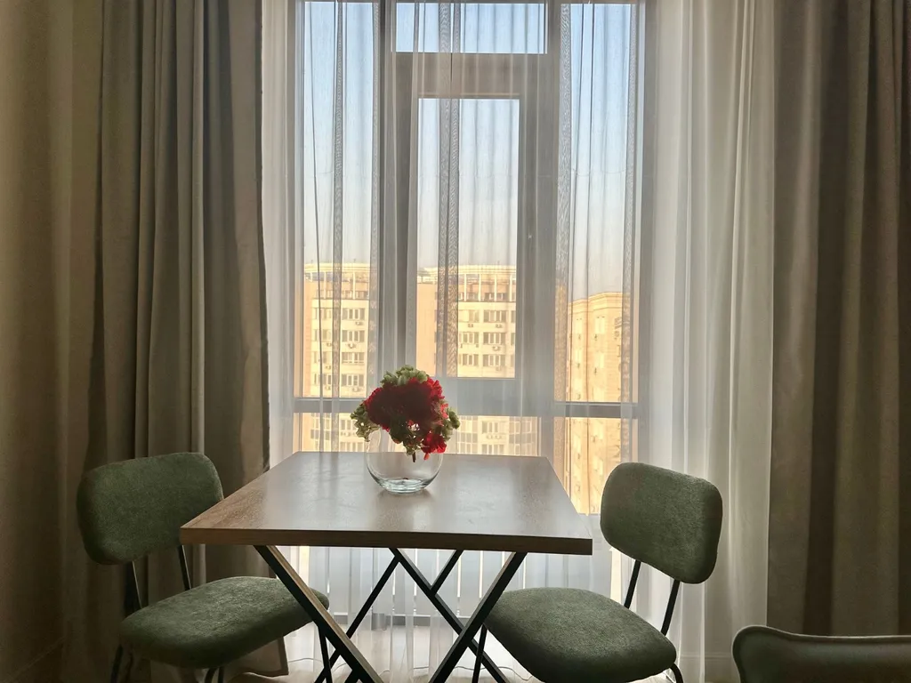 Квартира Уютная студия Нурай в центре Алматы — Алматы