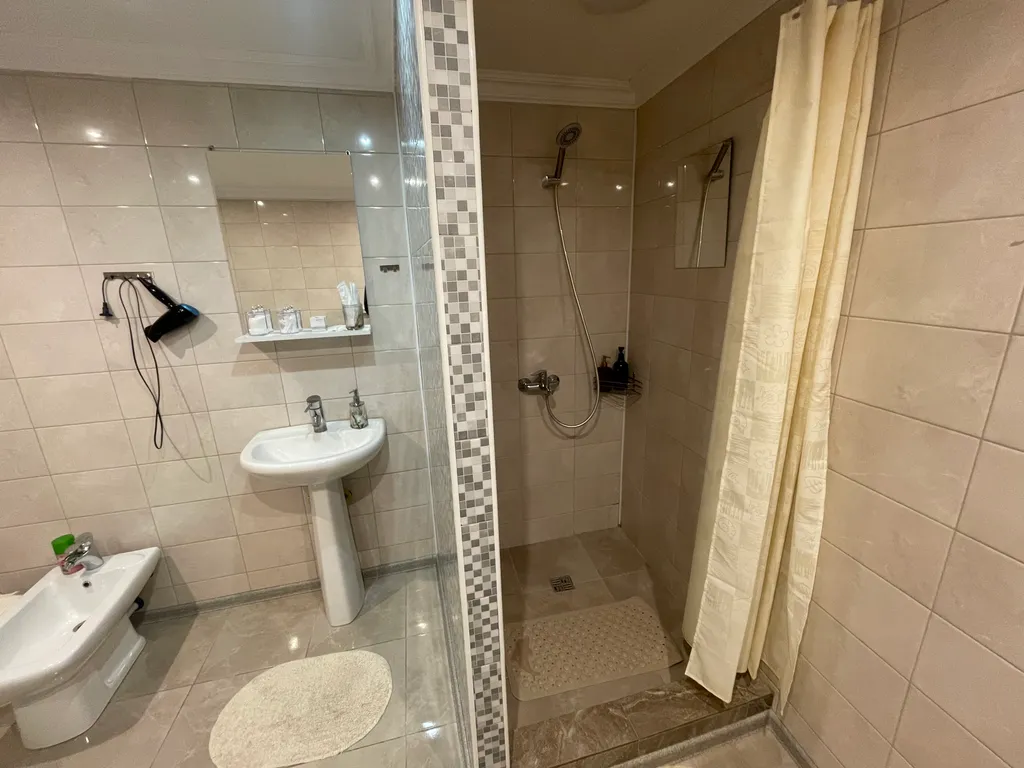 Комфортная 1-комнатная квартира в гостевом доме в самом центре