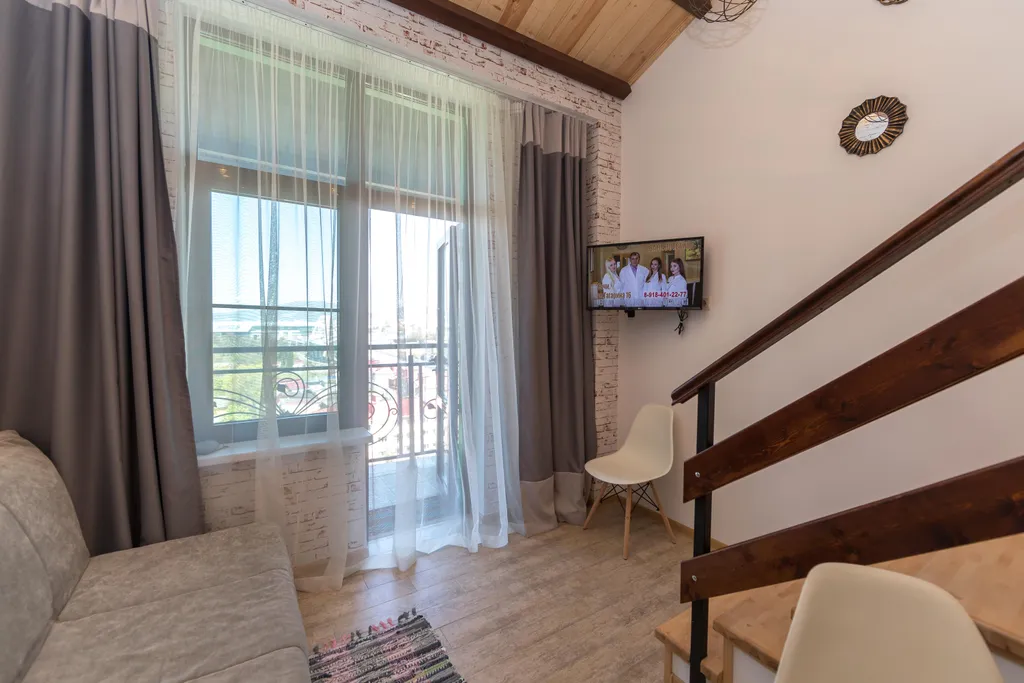 Двухуровневая стильная квартира у моря