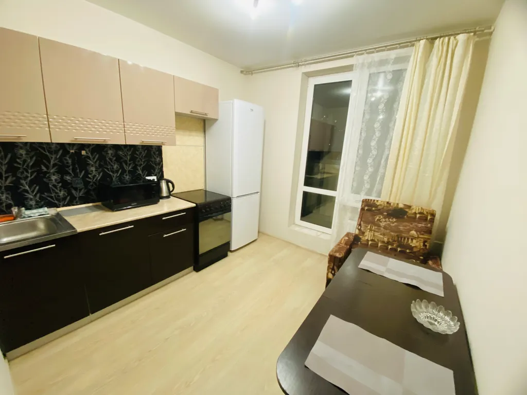 Уютная квартира с прекрасным видом на город в огнях