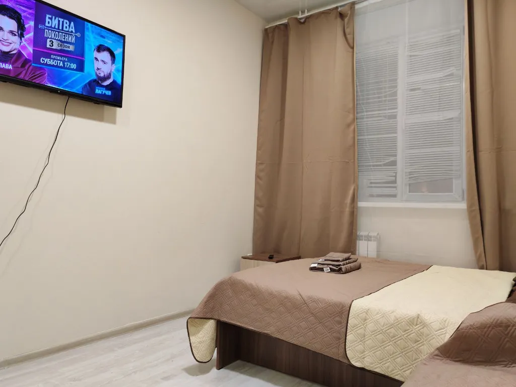 Светлая квартира с большими окнами и высокими потолками