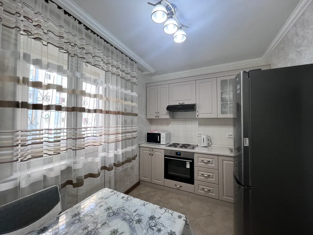 Уютная квартира напротив спорткомплекса Алматы Арена