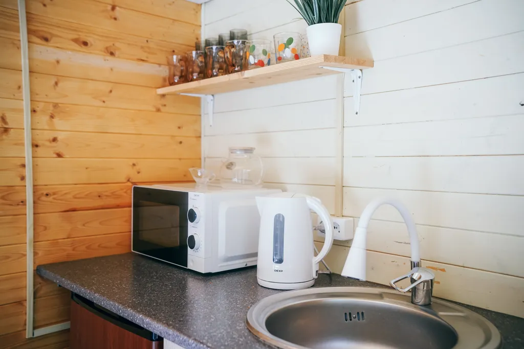 Уютный домик в лесу с террасой и беседкой