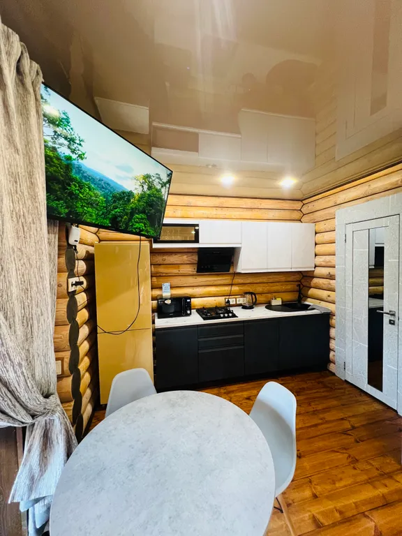 Семейные апартаменты Балдино в доме из сруба