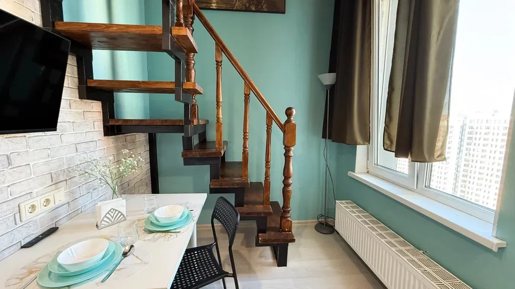 Стильная двухуровневая студия