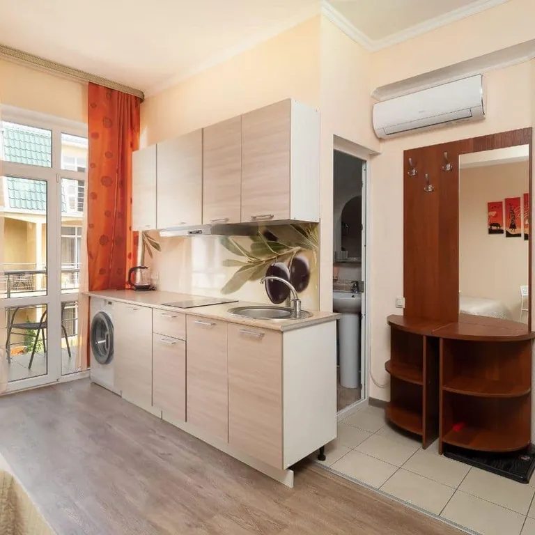 Квартира Квартира Уютная студия у моря с теплым бассейном — Сириус